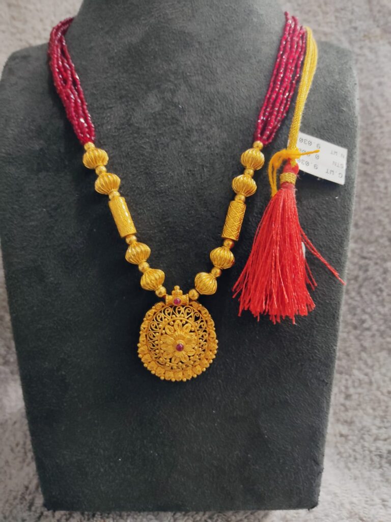 gold mani mala designs with gold pipes