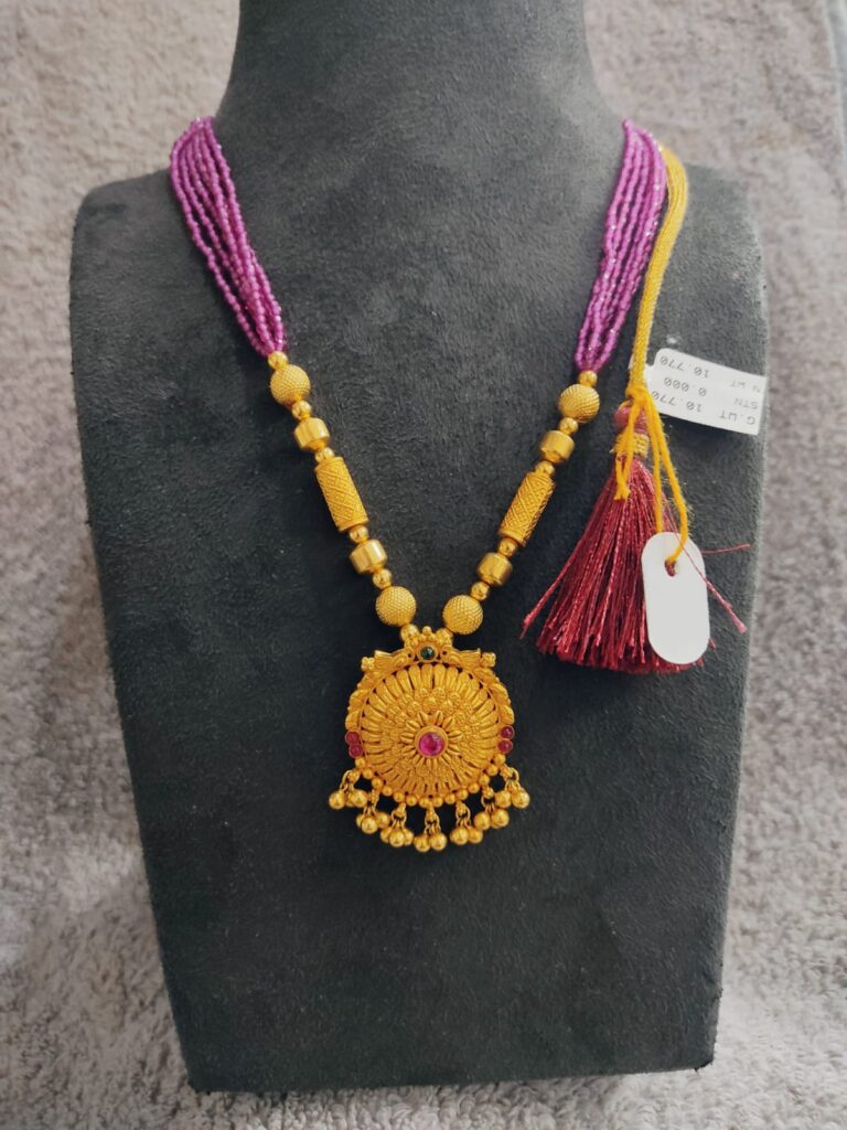 gold mala design with pink crsytals