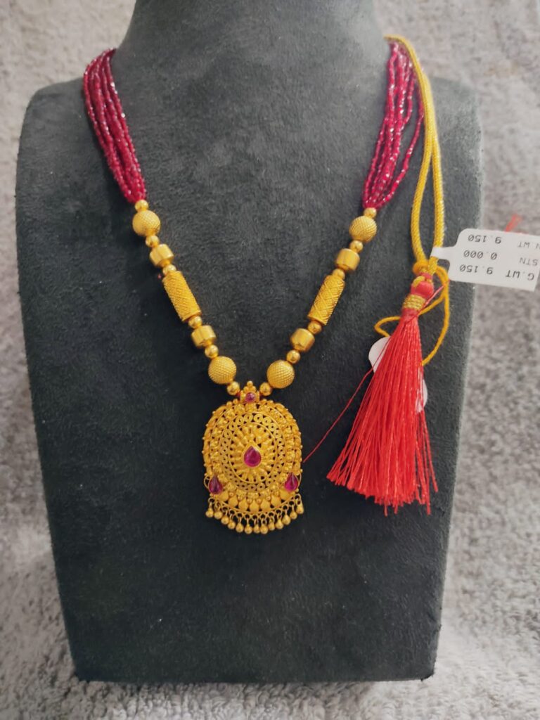 gold wax beads necklace with red beads